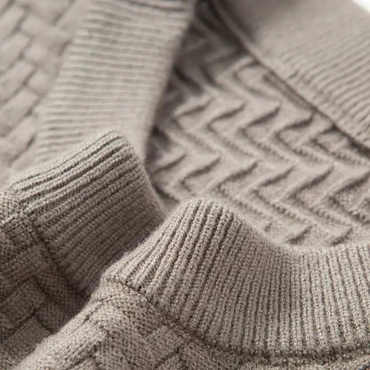 Soft women's textured knit sweater in a stylish, relaxed fit, ideal for cozy fall and winter fashion.