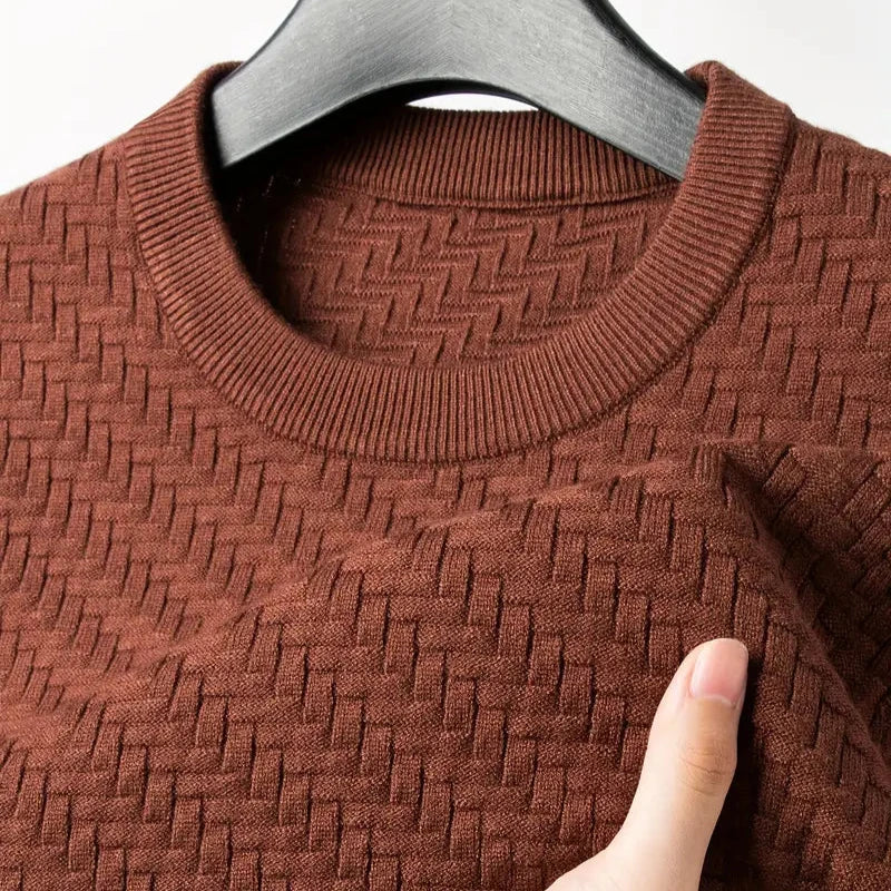 Cozy women's relaxed fit textured knit sweater, a comfortable long sleeve top for stylish everyday wear.