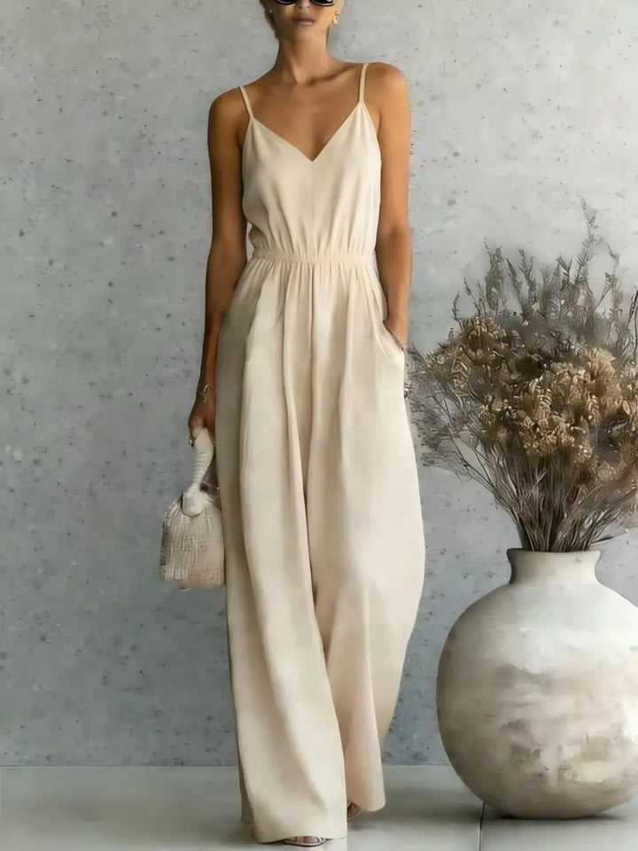 Effortless women's V-neck wide leg casual jumpsuit. A comfortable, chic one-piece for summer or vacation wear.
