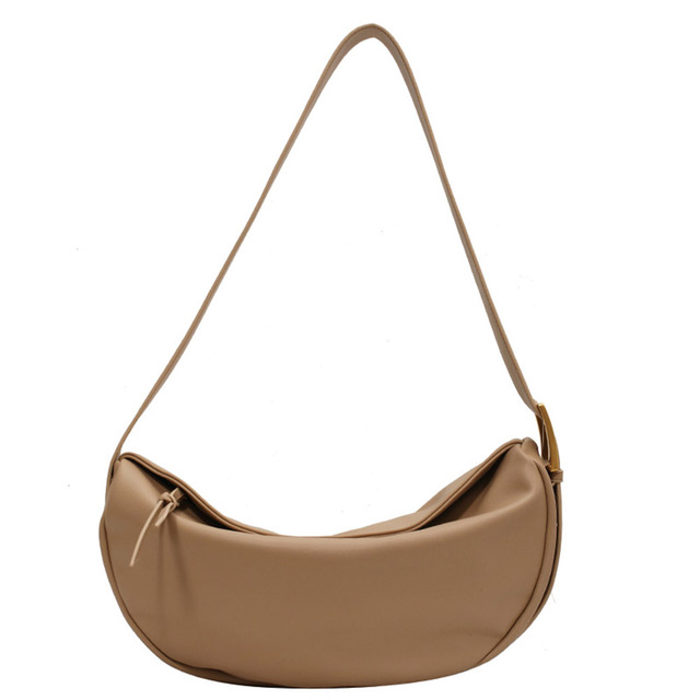Elegant vegan leather shoulder bag for women, featuring a versatile adjustable strap for comfort.