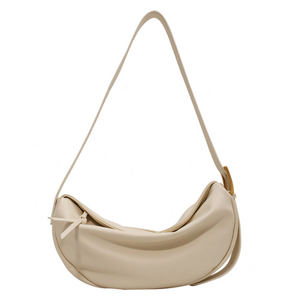 Fashionable women's vegan leather handbag; a chic crossbody purse with an adjustable shoulder strap.