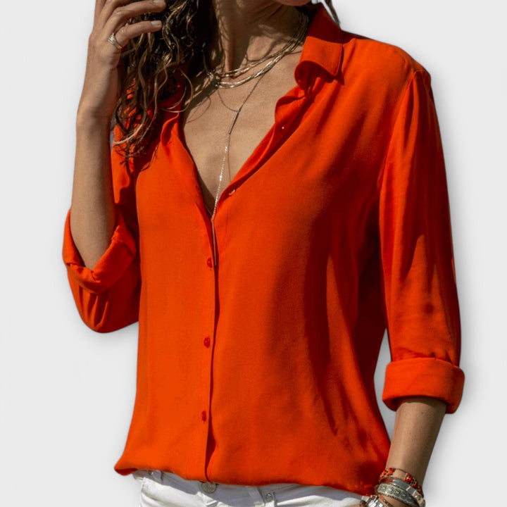Elegant white women's long-sleeve blouse, perfect for professional office wear & evening events.