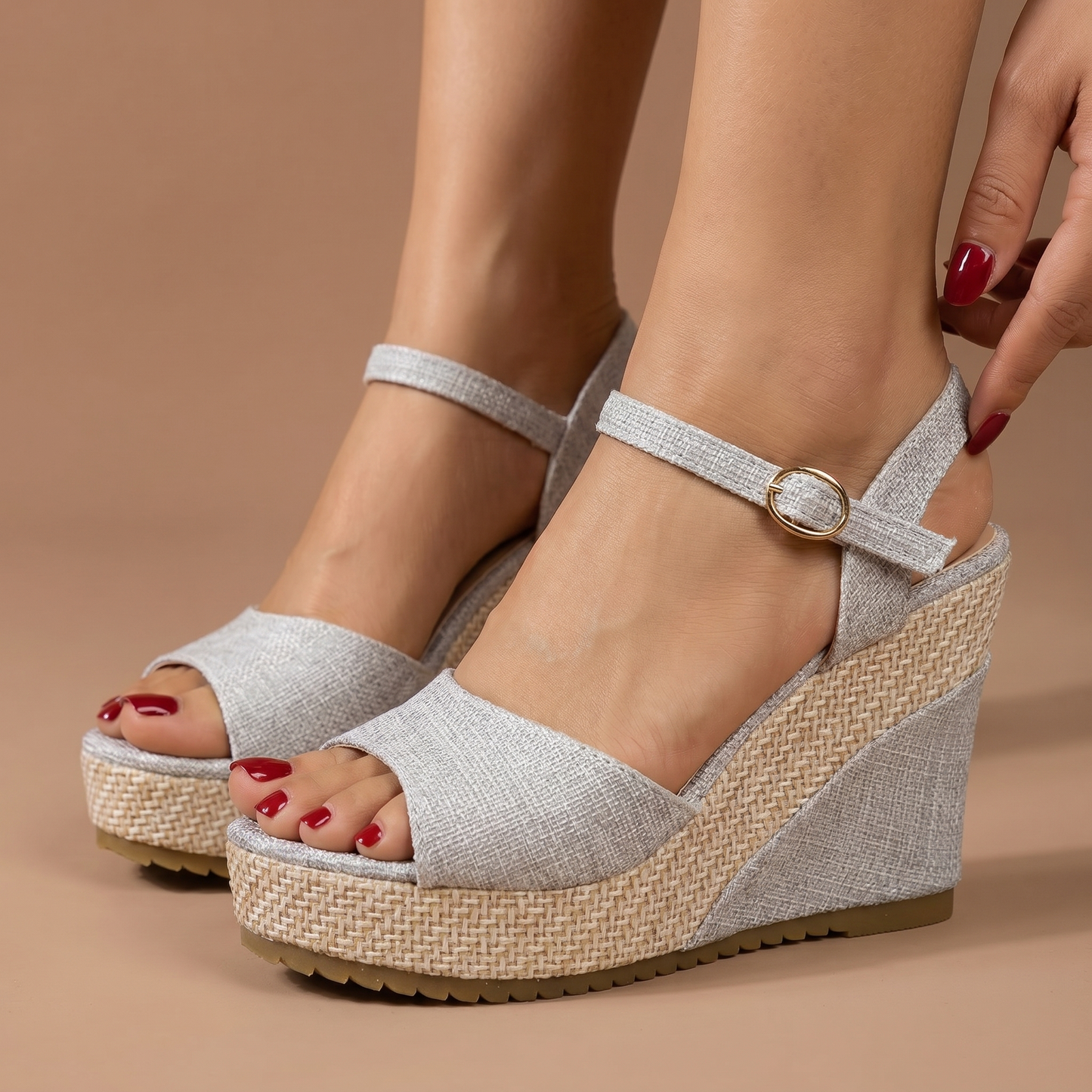 Stylish women's wedge heels with a secure ankle strap, offering chic comfort for any occasion.