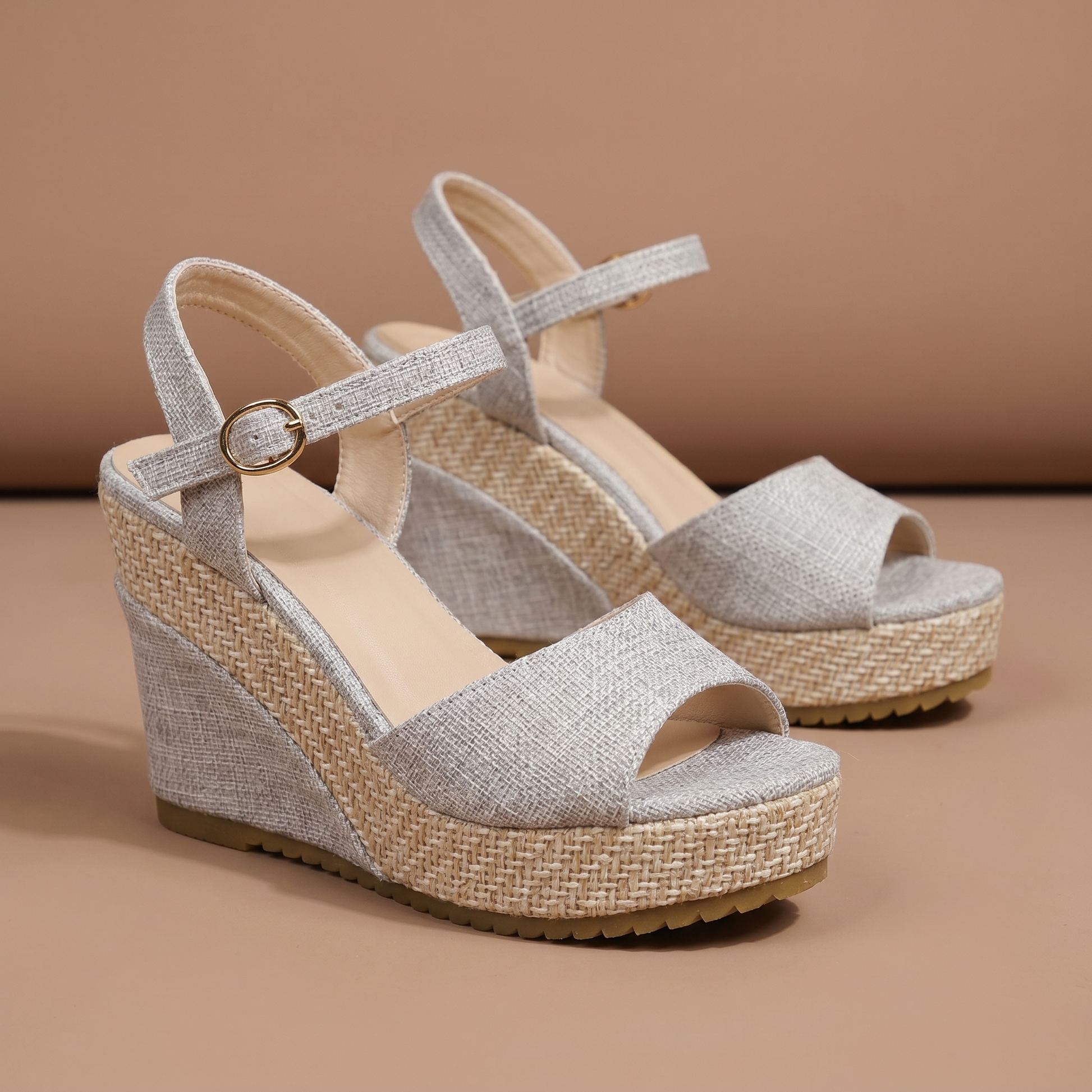 Women's elegant wedge heels with ankle strap support, perfect for comfortable and chic summer dress fashion.