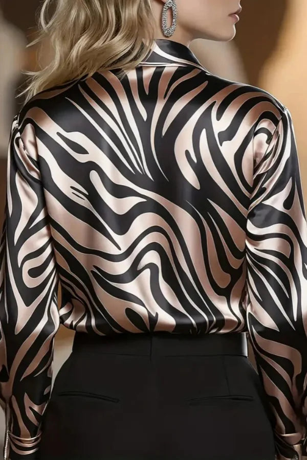 Women's fashion zebra print long sleeve button-down shirt with a luxurious liquid sheen, great for work or nights out.