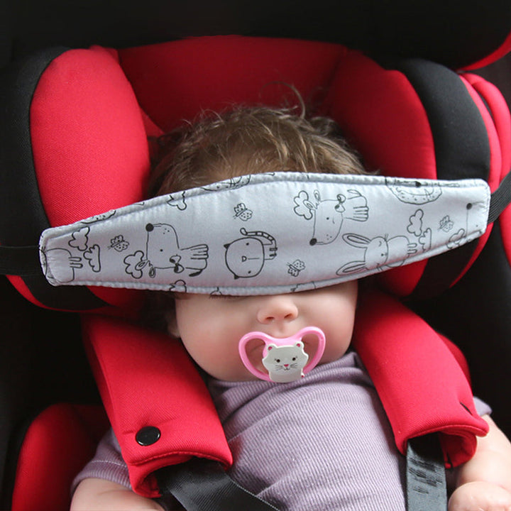 Children's car seat headrest with soft padding for comfortable naps & sleep support during long car rides.
