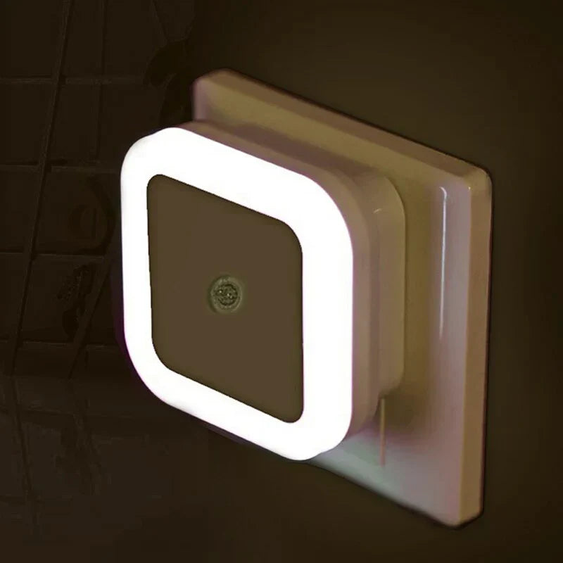Children's motion sensor night light, 2-pack, providing warm white LED light for kids' safety in dark rooms.