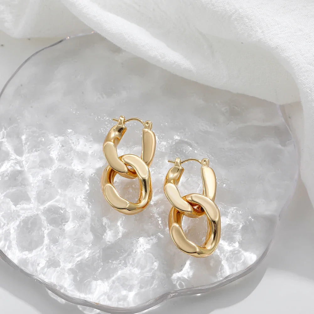 Statement chunky gold link drop earrings, a must-have gold accessory for women's fashion.