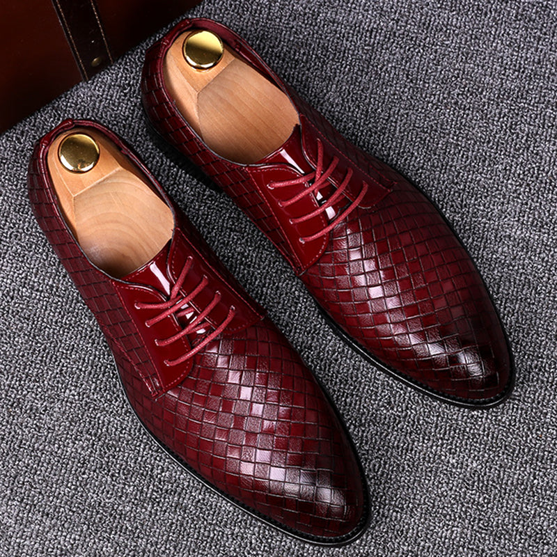 Classic black leather men's lace-up dress shoes, offering sophisticated style and comfort for formal events & office wear.