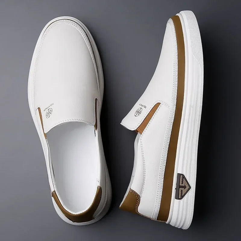 Men's classic white leather slip-on loafers, a comfortable and stylish choice for casual and everyday wear.
