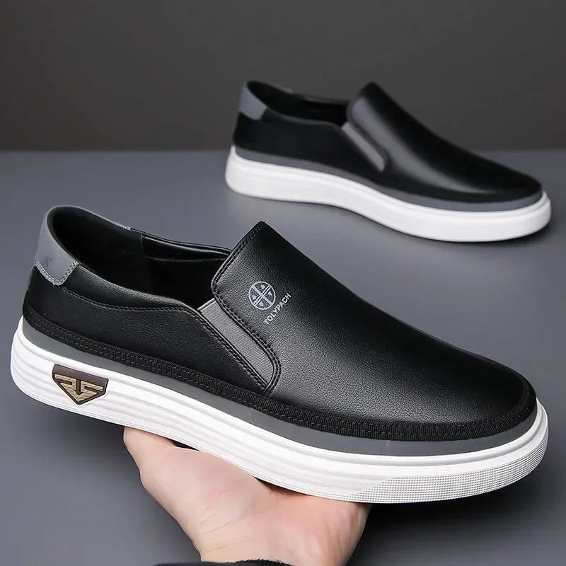 Elegant men's casual leather slip-on shoes in black, combining classic style with easy wear.