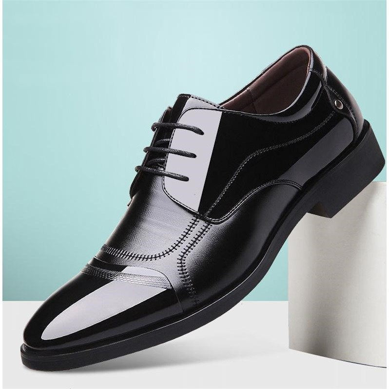 High-quality men's black Oxford shoes, essential formal footwear for a sharp look.