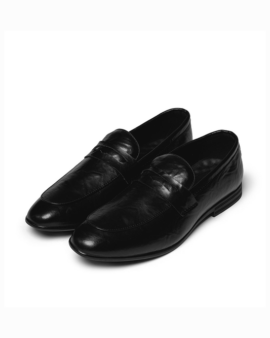 Classic black men's slip-on leather dress loafers for professional business style.