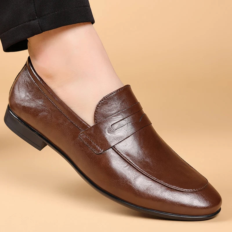 Men's formal brown leather slip-on dress loafers, perfect classic footwear for any professional setting.