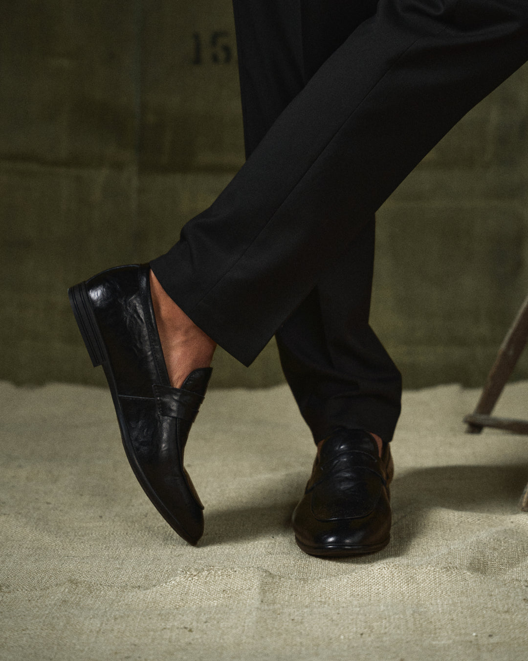 Polished brown leather slip-on loafers, perfect men's footwear for formal or business casual.
