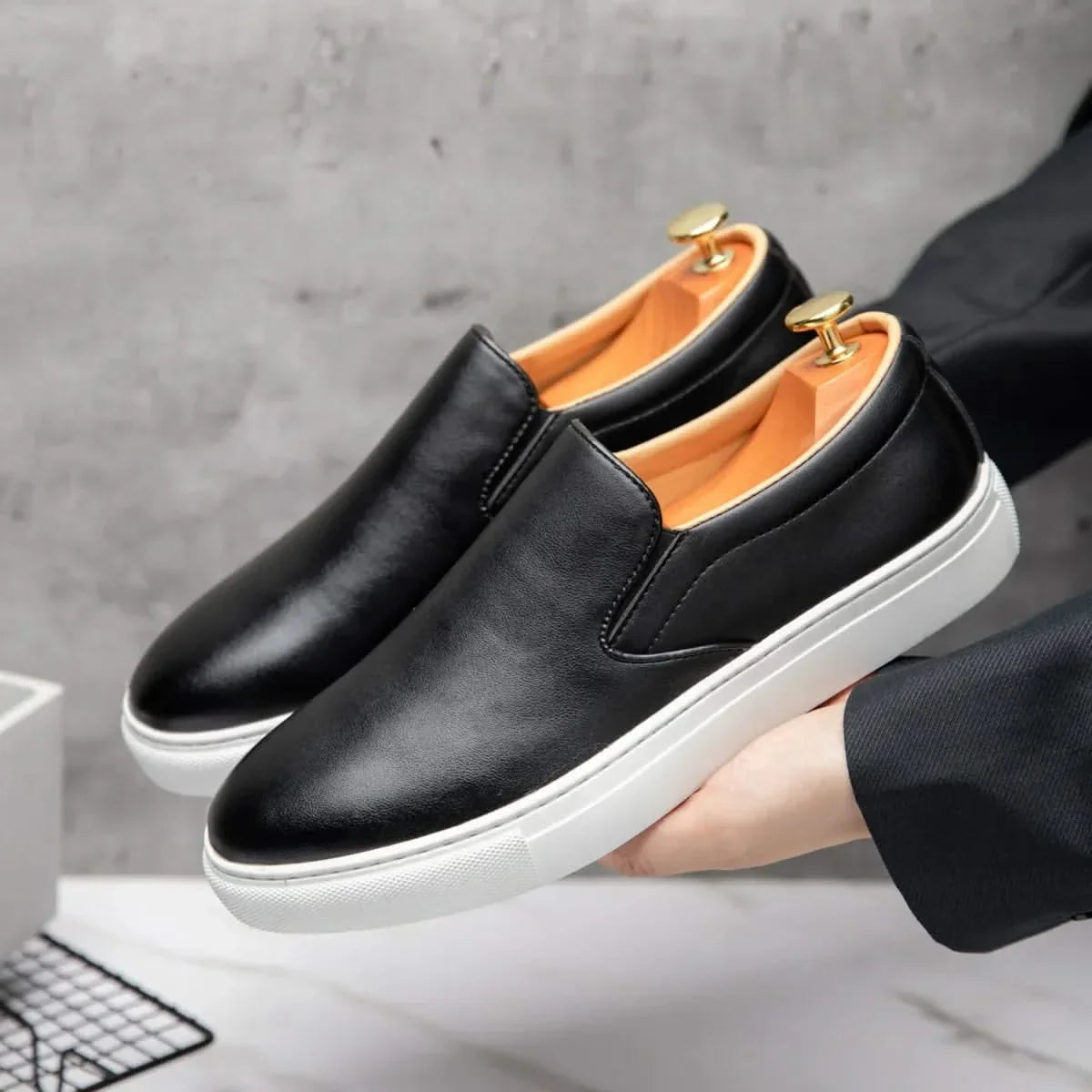 Elegant brown men's slip-on loafers, perfect for smart casual or dressy occasions. Versatile men's fashion footwear.