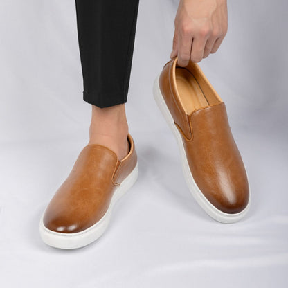 Essential men's classic slip-on loafers, versatile and comfortable footwear for both casual and formal events.