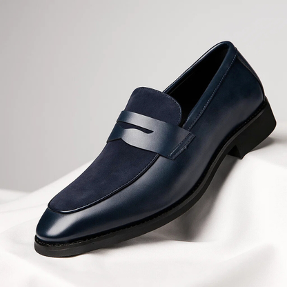 Classic men's black leather penny loafers, perfect for smart casual or dressy everyday wear.