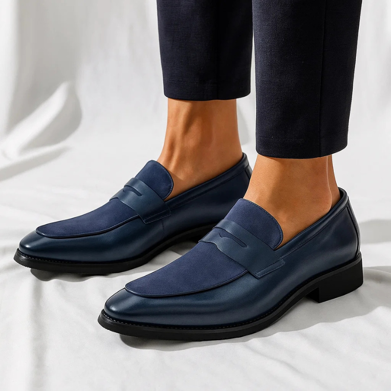 Refined men's black leather penny loafers, ideal comfortable dress shoes for everyday refined style.