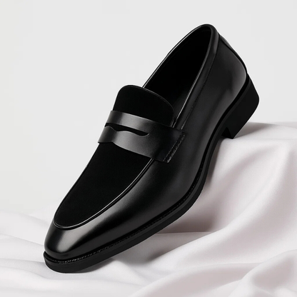 Men's slip-on loafers: black leather penny style, offering classic comfort for formal or casual outfits.