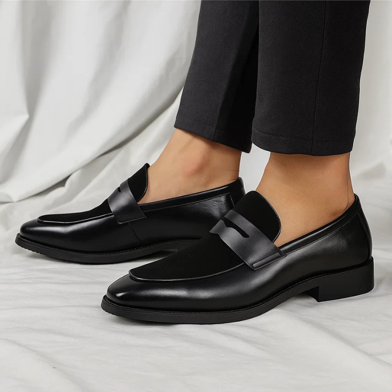 Versatile men's black penny loafers, classic dress shoes for a refined, comfortable, everyday style.