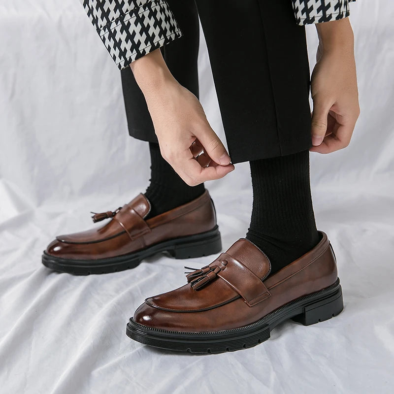 Timeless men's dress loafers, essential elegant slip-on footwear for a sharp, polished look.