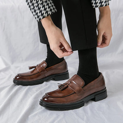 Timeless men's dress loafers, essential elegant slip-on footwear for a sharp, polished look.