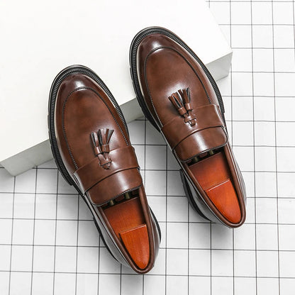 Gentleman's classic leather loafers, offering an elegant & comfortable slip-on option for daily wear.