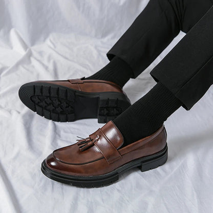 Elegant slip-on men's loafers, ideal dress shoes for formal events, office, or sophisticated casual outfits.