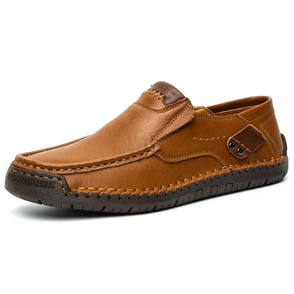 Versatile men's slip-on loafers in brown suede, ideal for both smart casual and formal dress occasions.