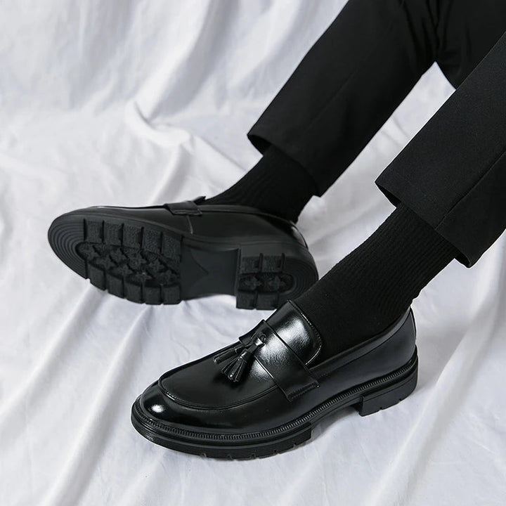 High-quality leather men's loafers, elegant slip-on shoes for sophisticated smart casual attire.