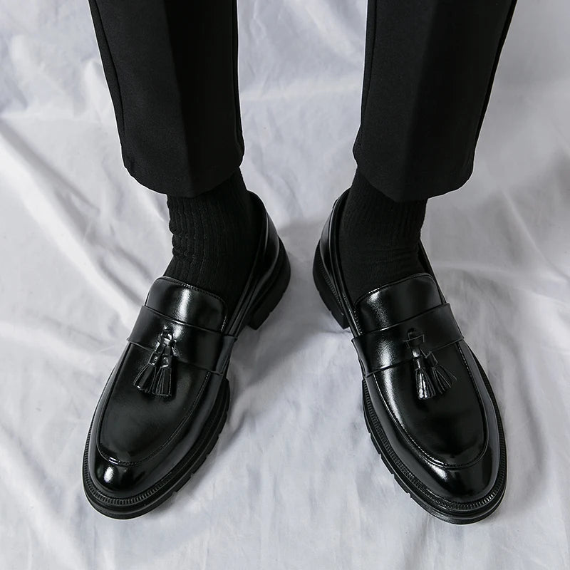 Classic men's dress loafers, a staple in gentlemen's fashion for both work and events.