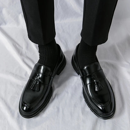 Classic men's dress loafers, a staple in gentlemen's fashion for both work and events.