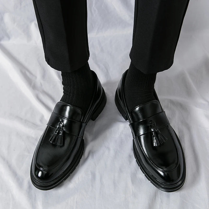 Classic men's dress loafers, a staple in gentlemen's fashion for both work and events.
