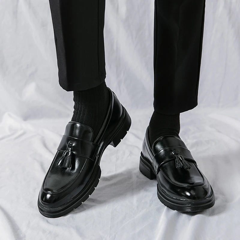 Refined slip-on men's loafers, offering elegance & comfort for any formal or casual setting.