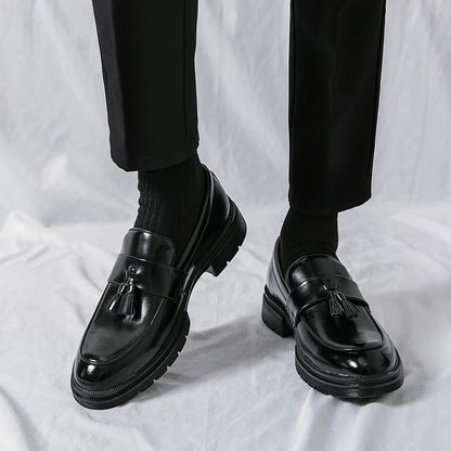 Refined slip-on men's loafers, offering elegance & comfort for any formal or casual setting.