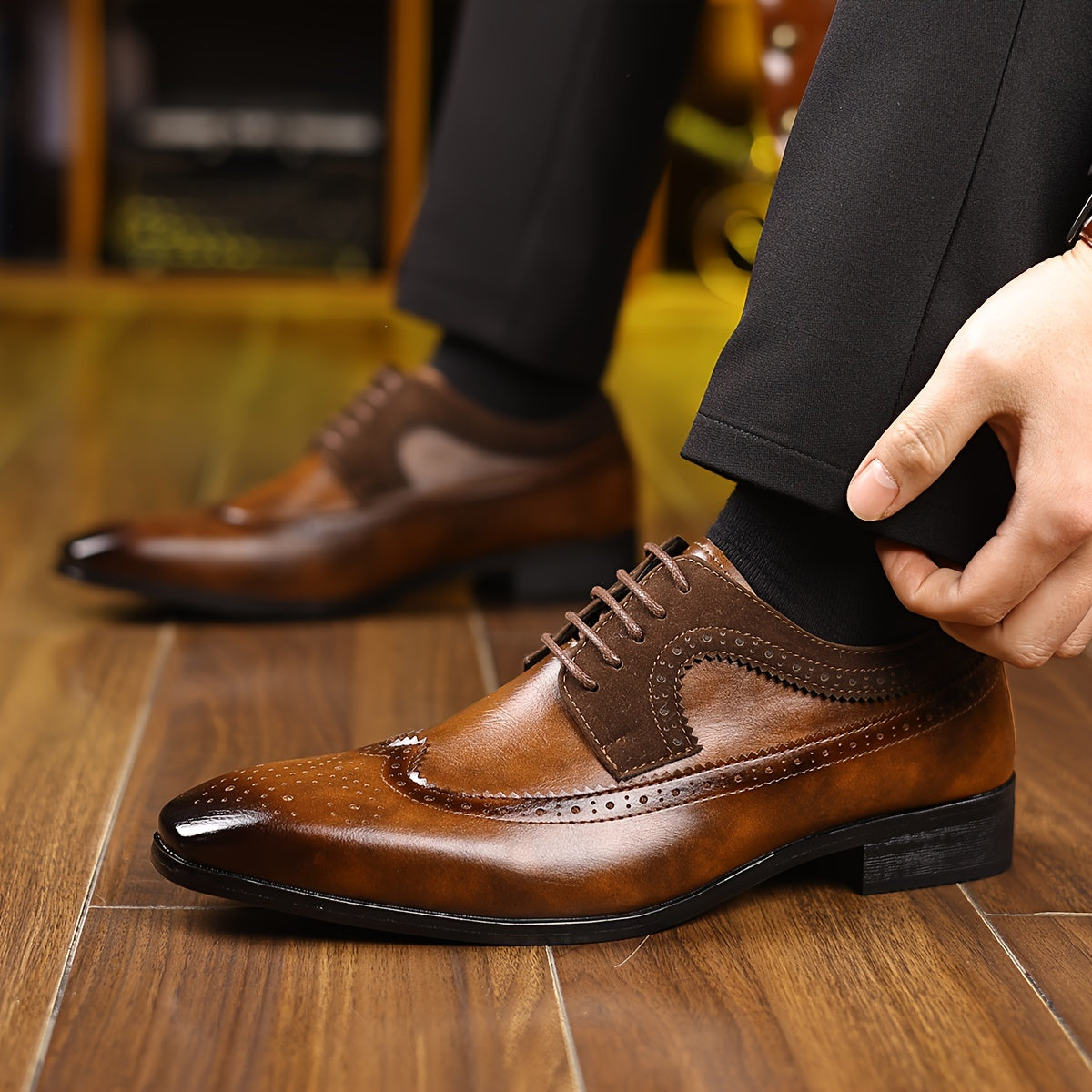 Sophisticated men's formal Oxford shoes with intricate brogue design, ideal for special occasions.