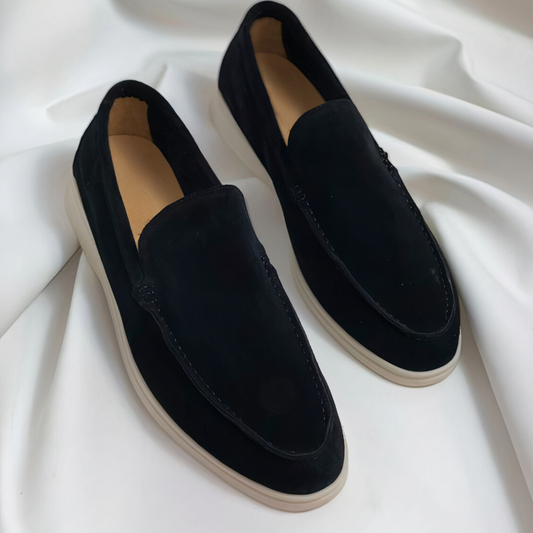 Classic men's black slip-on loafers, ideal for sophisticated office style or elegant casual wear.
