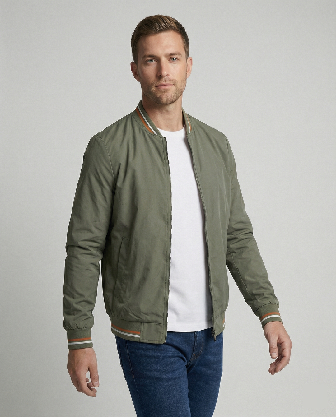 Classic men's bomber jacket, slim fit, ribbed trim. Essential fall fashion outerwear for versatile casual everyday wear.