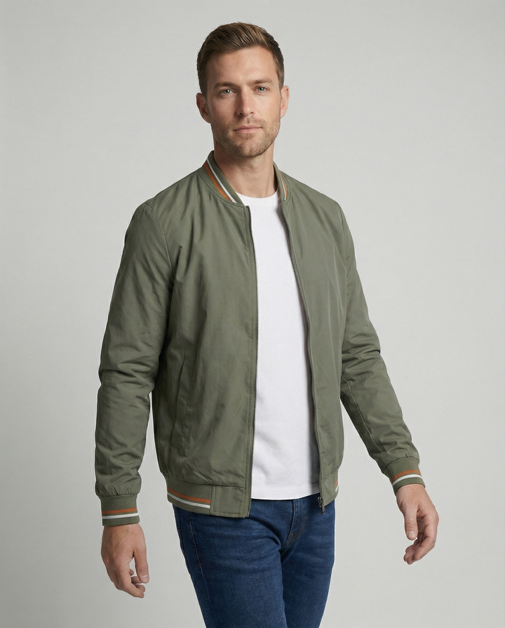Classic men's bomber jacket, slim fit, ribbed trim. Essential fall fashion outerwear for versatile casual everyday wear.