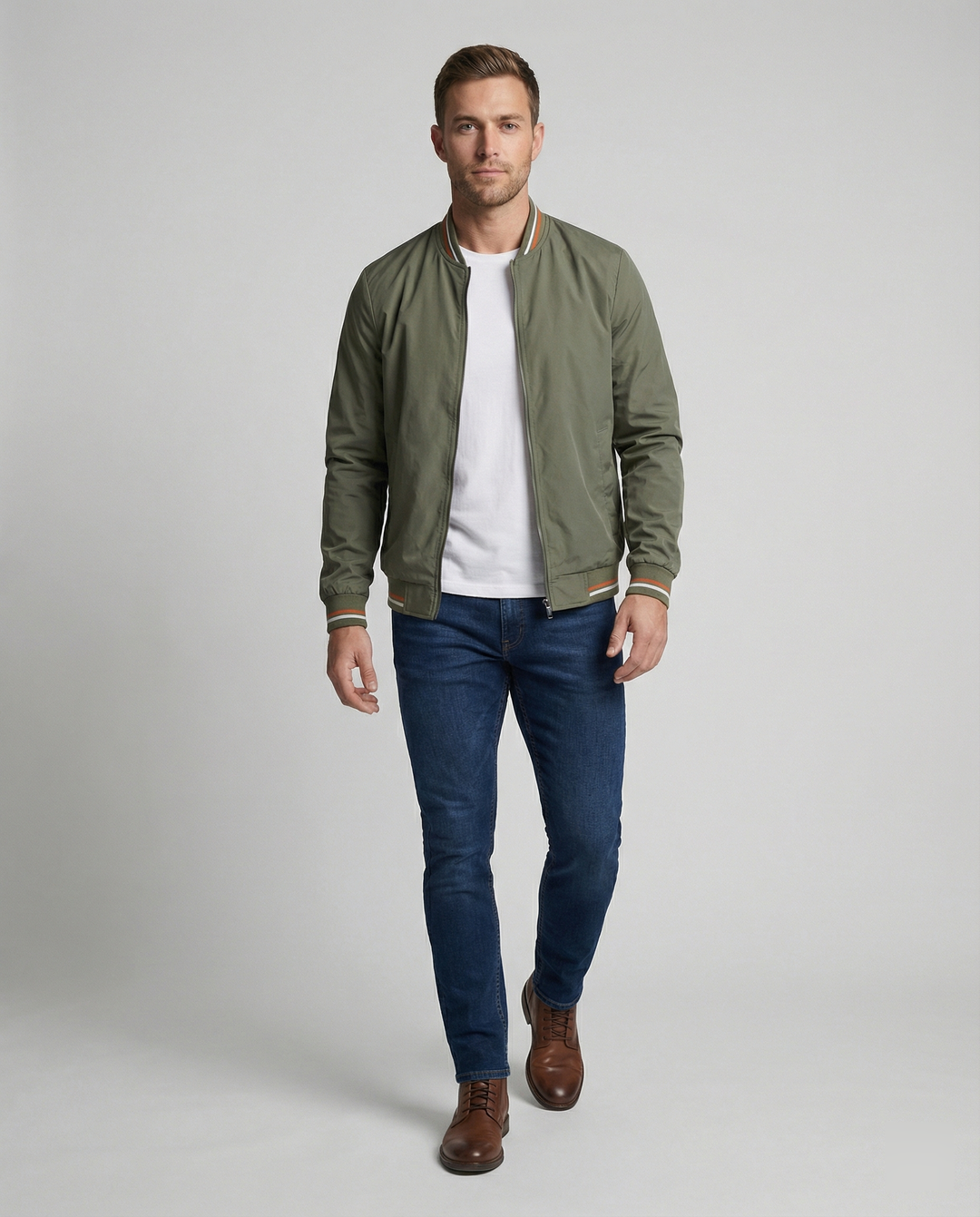 Stylish men's bomber jacket with ribbed trim. A classic, versatile outerwear piece for fall fashion and casual wear.