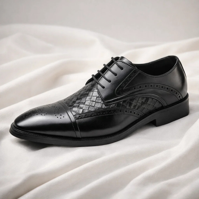 Formal men's footwear: Elegant classic brogue dress shoes, lace-up oxford for sophisticated look.