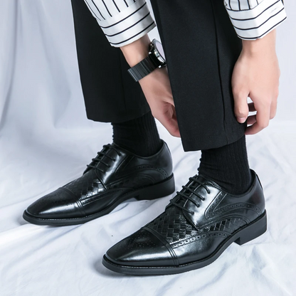 Classic brogue dress shoes for men. Elegant detailing and comfortable lace-up oxford design.