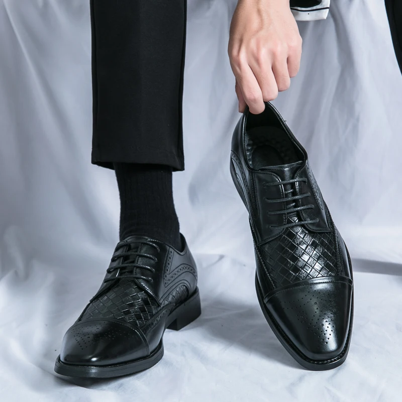 Formal men's brogue footwear. Elegant classic design, lace-up oxford for stylish comfort.