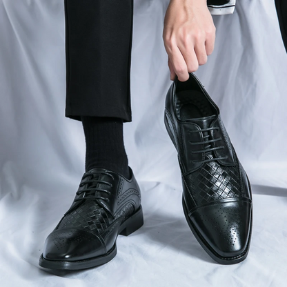Formal men's brogue footwear. Elegant classic design, lace-up oxford for stylish comfort.