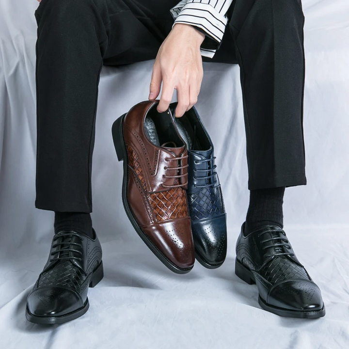 Elegant classic brogue shoes for men. Formal lace-up oxford footwear with sophisticated detailing.