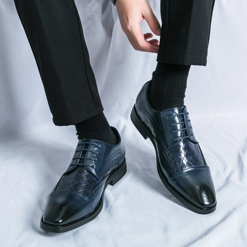 Men's elegant brogue dress shoes with classic detailing. Perfect formal lace-up oxford footwear.