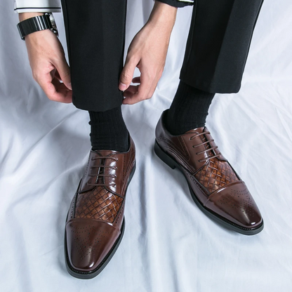 High-quality men's brogue dress shoes with elegant detailing. Classic lace-up formal oxford.