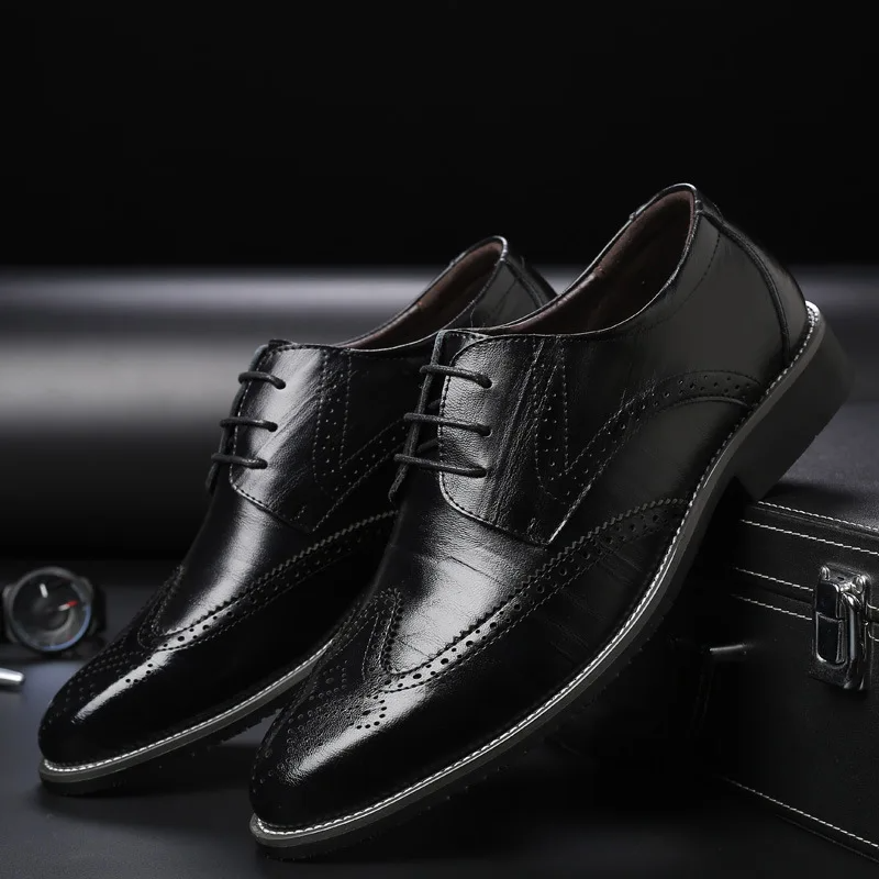 Sophisticated men's black leather brogue oxford dress shoes for a sharp, professional look.