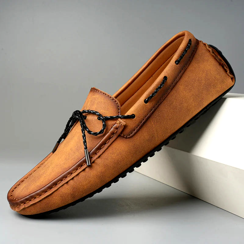 Classic men's brown loafers with timeless design, perfect as slip-on dress or casual shoes for all-day comfort.